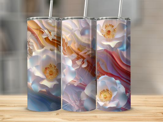 Three floral tumblers with pastel flowers and abstract background.