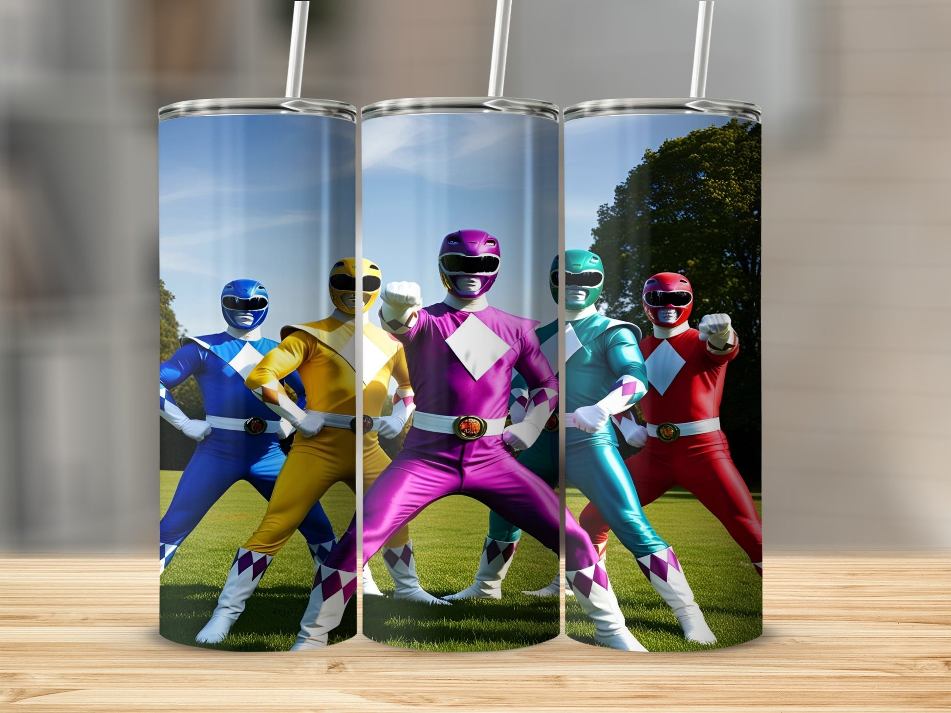 Five Power Rangers in colored suits stand on grass, facing forward.