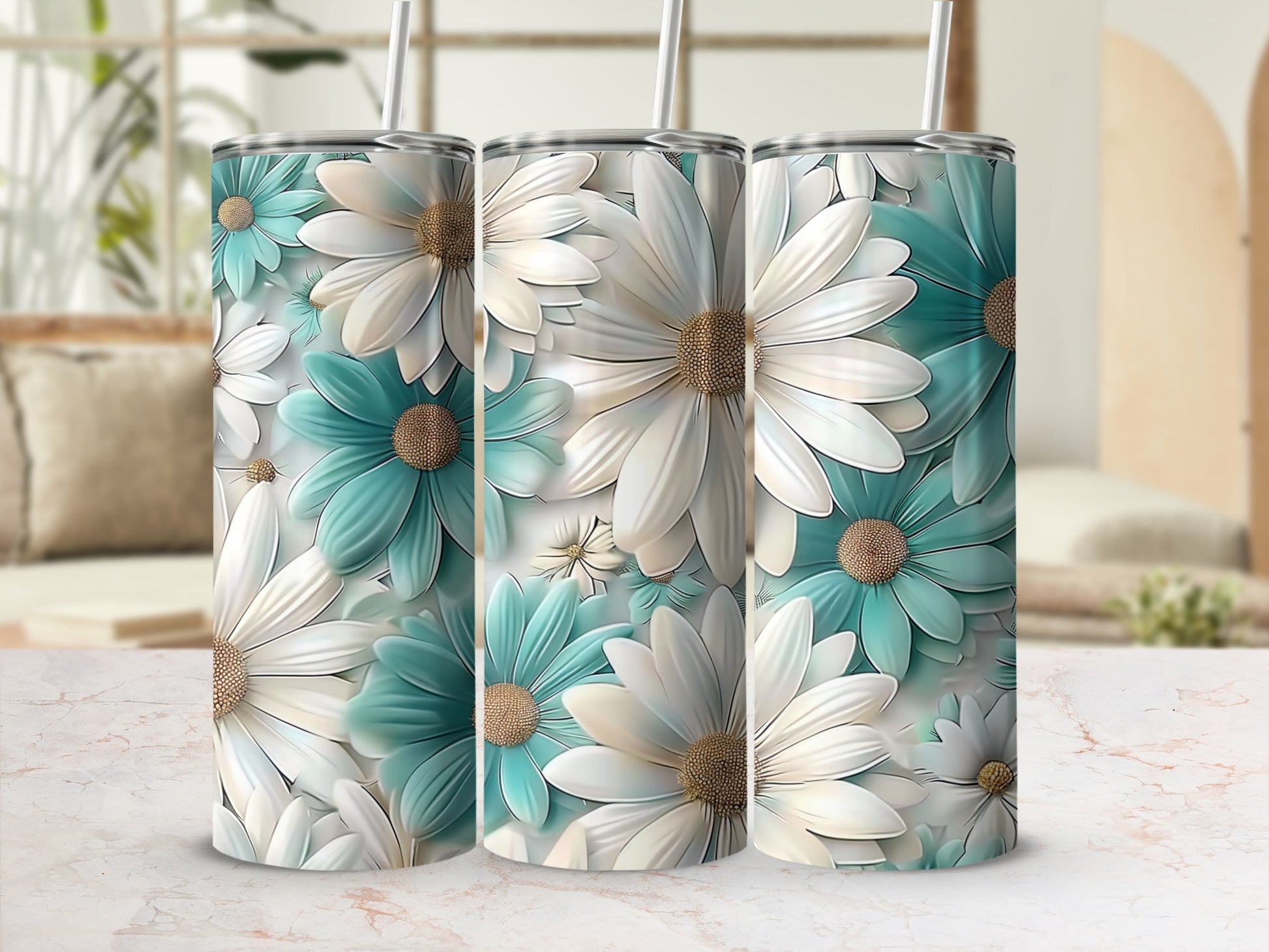 Three tumblers with teal and white daisy floral design.
