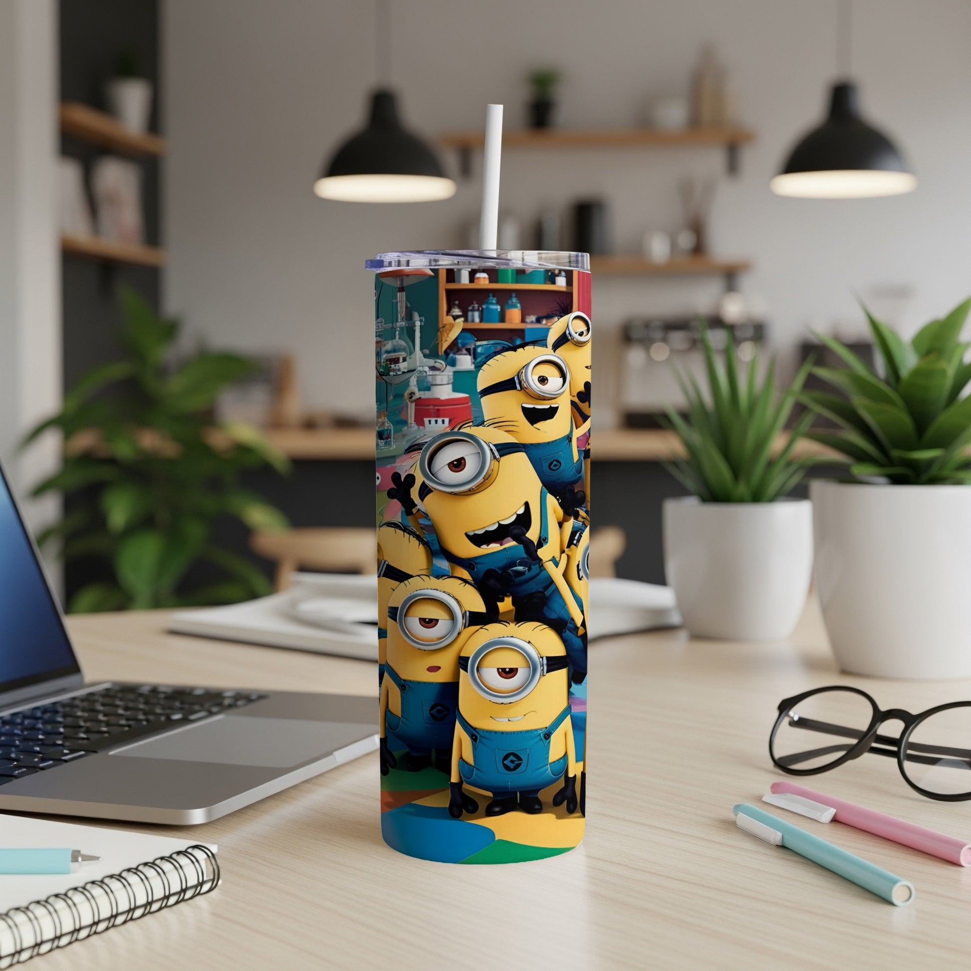 Minions characters on a colorful skinny tumbler with a white straw.