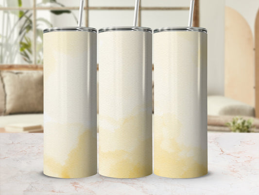 Three tall, skinny tumblers with a watercolor wash design.