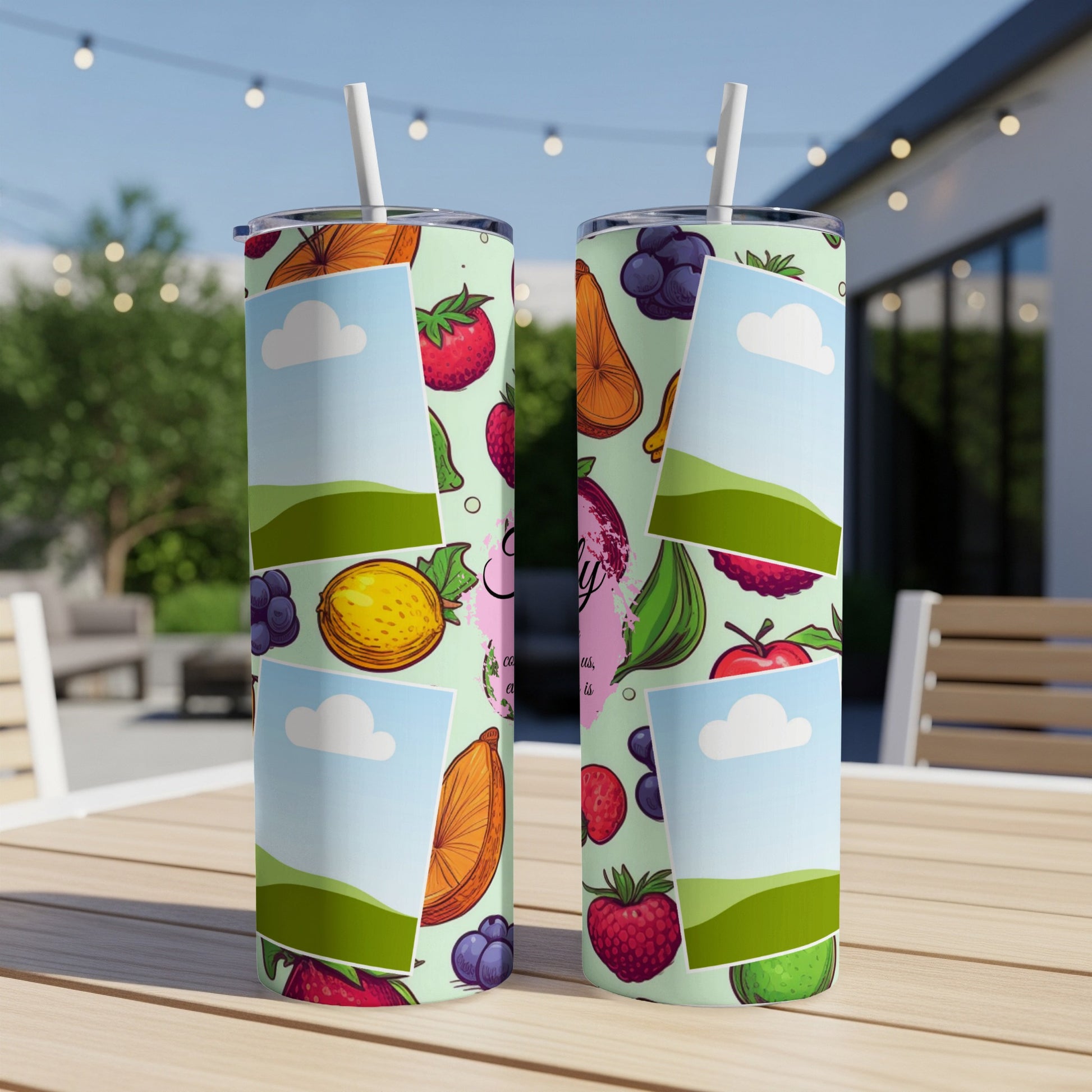 Two tumblers with fruit patterns and photo placeholders on a wooden table.