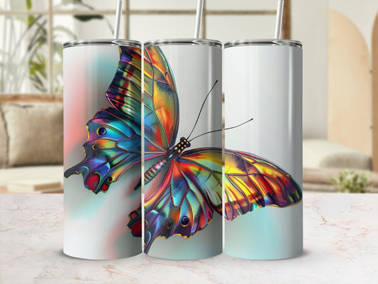 Three tumblers with colorful iridescent butterfly designs.