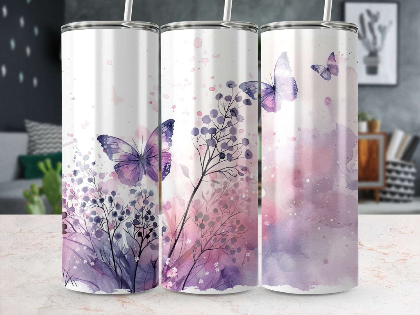 Three tumblers with purple watercolor butterflies and floral designs.