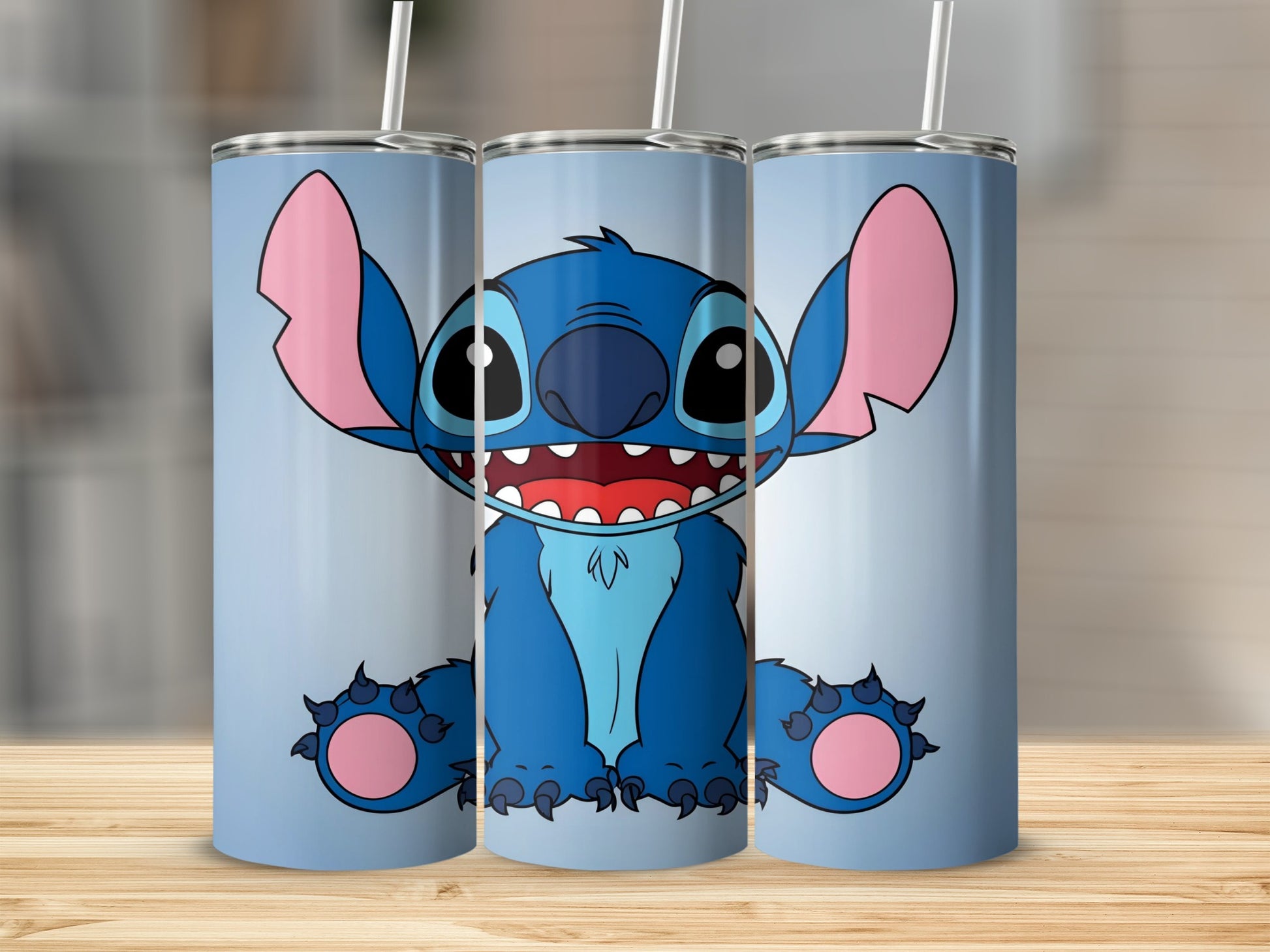 Blue cartoon character Stitch sitting with large ears and wide smile.