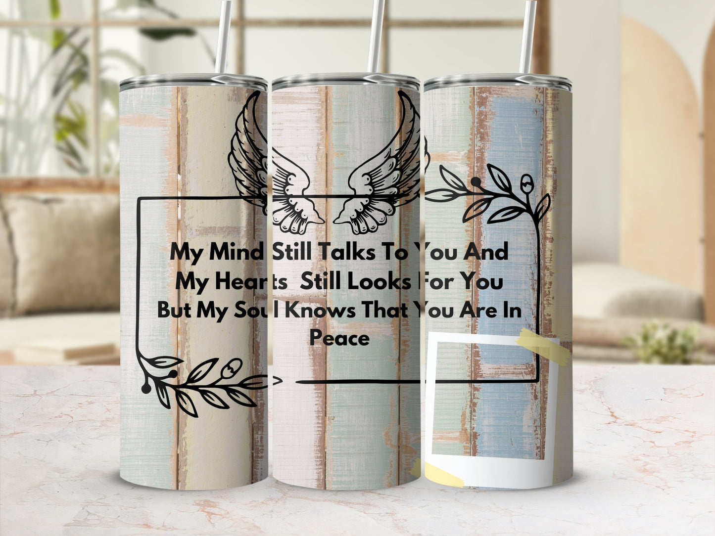 Tumbler with wings and quote "My Mind Still Talks To You And My Hearts Still Looks For You".