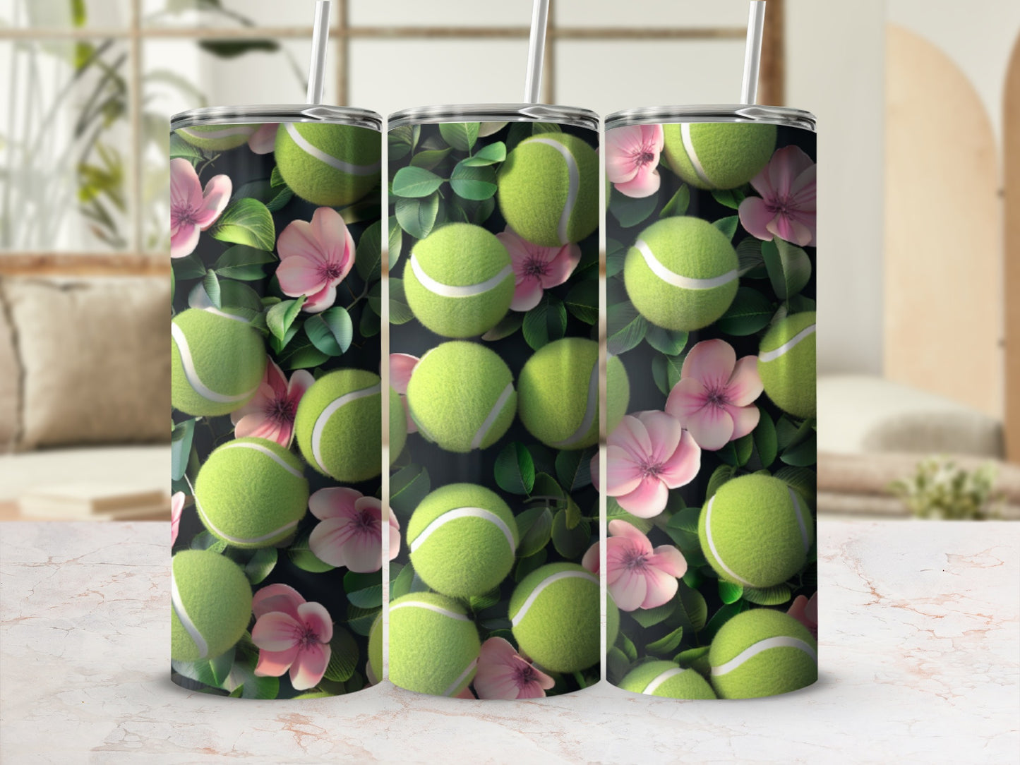 Tumbler with tennis balls and pink flowers pattern.