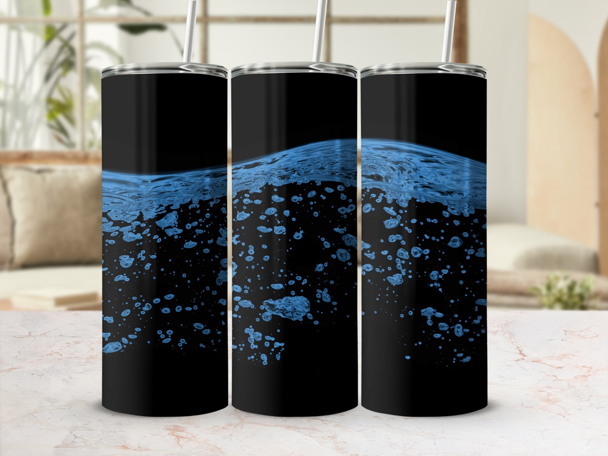Three black tumblers with a blue wave and bubble design.