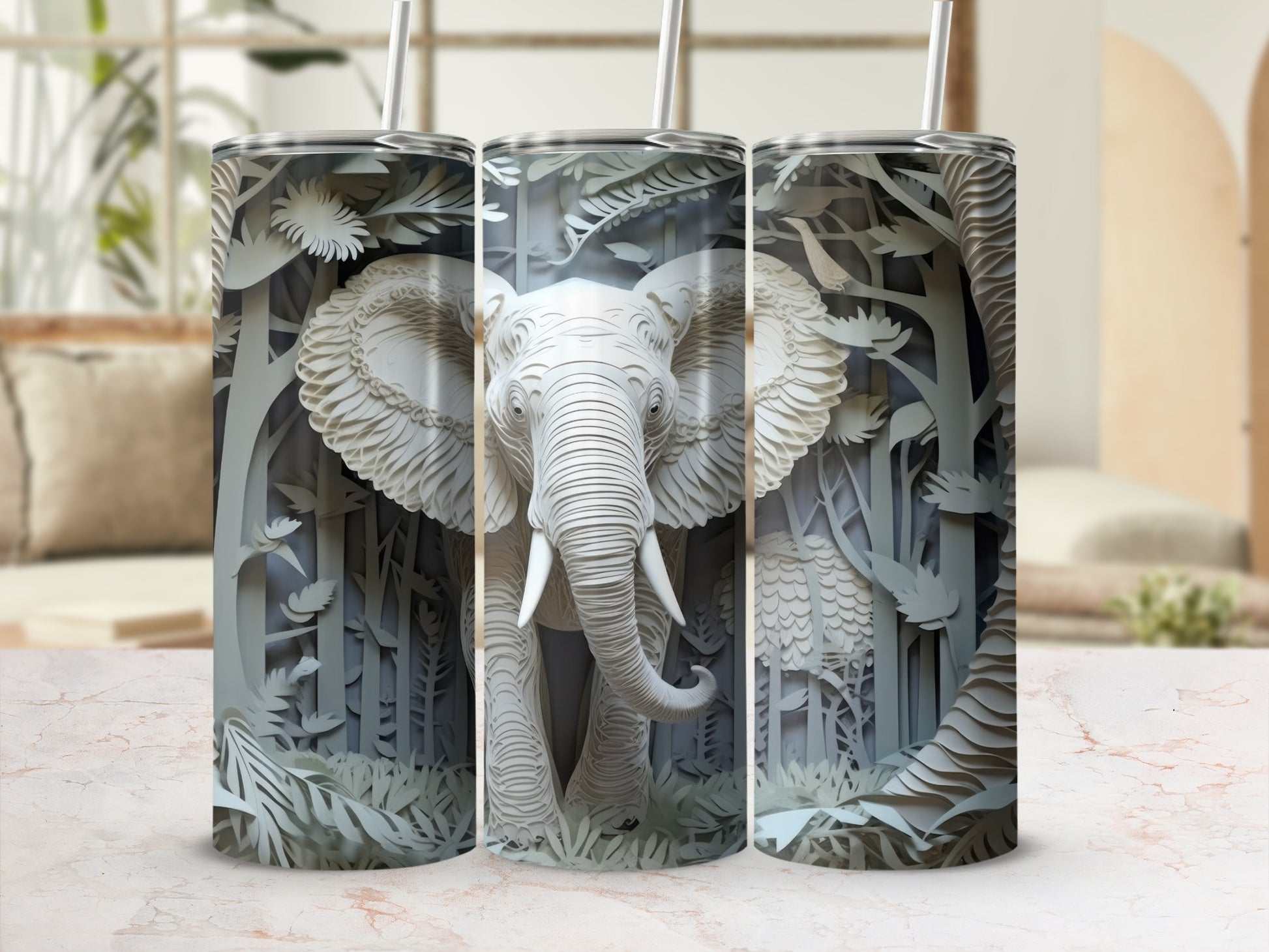 3D papercraft-style elephant design on three tumblers.