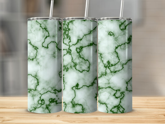 Three tall tumblers with a white and green marble pattern and straws.
