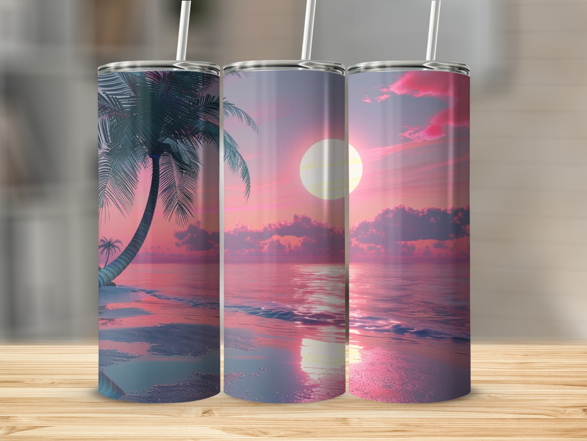 Three tumblers featuring a tropical sunset with a palm tree.