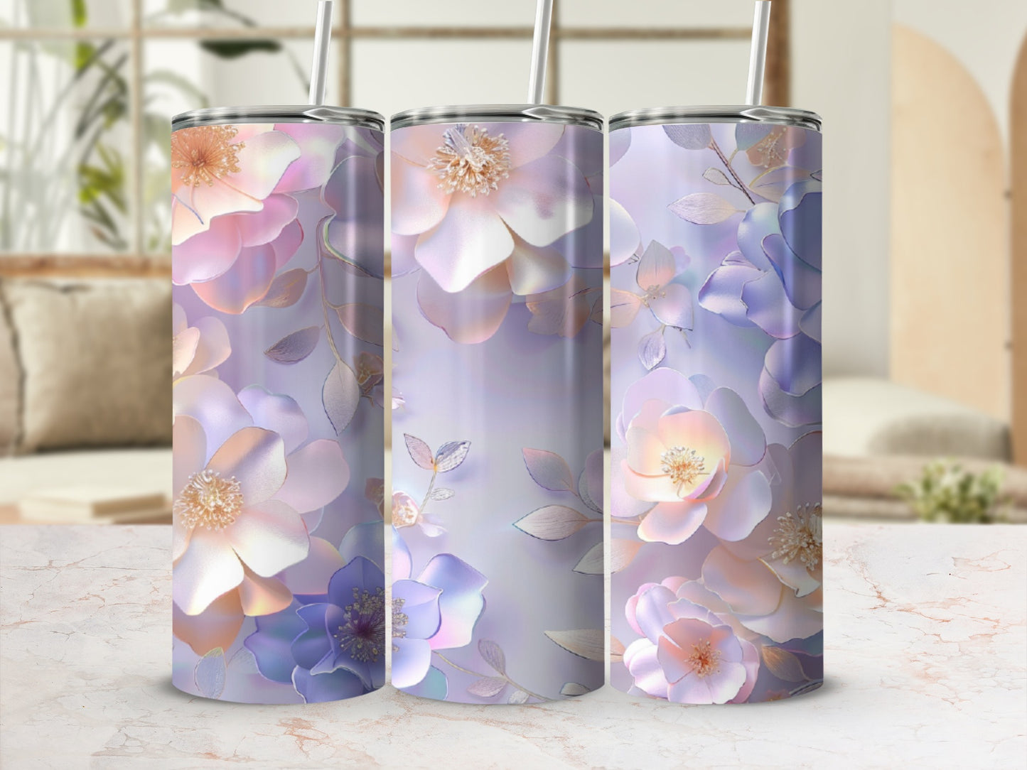 Three tumblers with floral designs in pastel purple and pink hues.