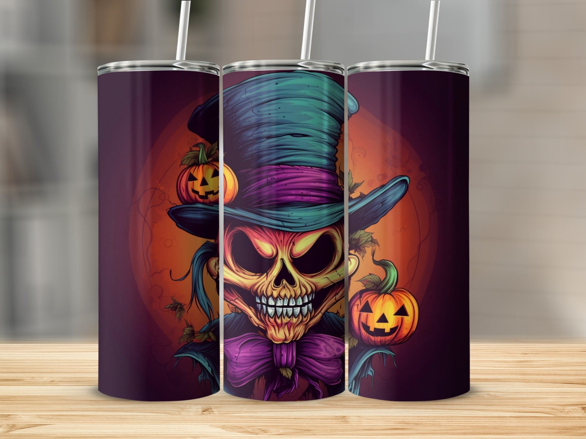 Tumblers featuring a scary skeleton face, top hat, and pumpkins in Halloween theme.