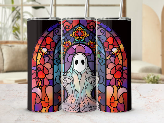 Stained glass ghost tumbler with floral accents on marble surface.