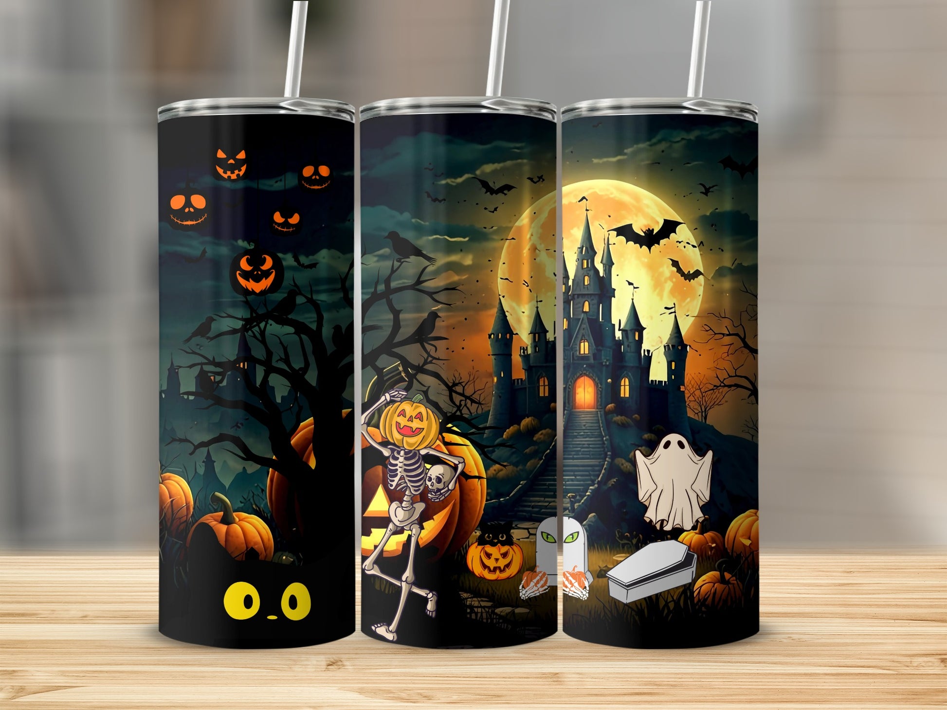 Halloween tumblers with black cat, skeleton, castle, ghost, and pumpkins.