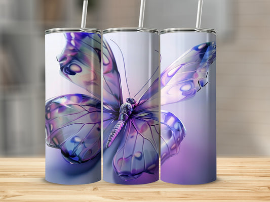 Three iridescent purple butterfly tumblers with straws on a wooden surface.