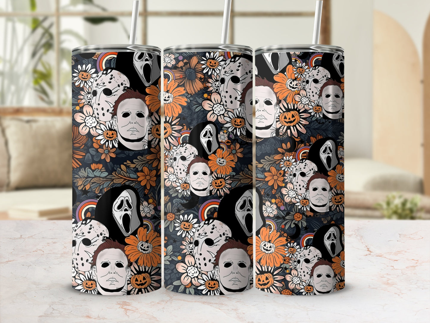 Horror movie masks and pumpkins on a floral background tumbler with straw.