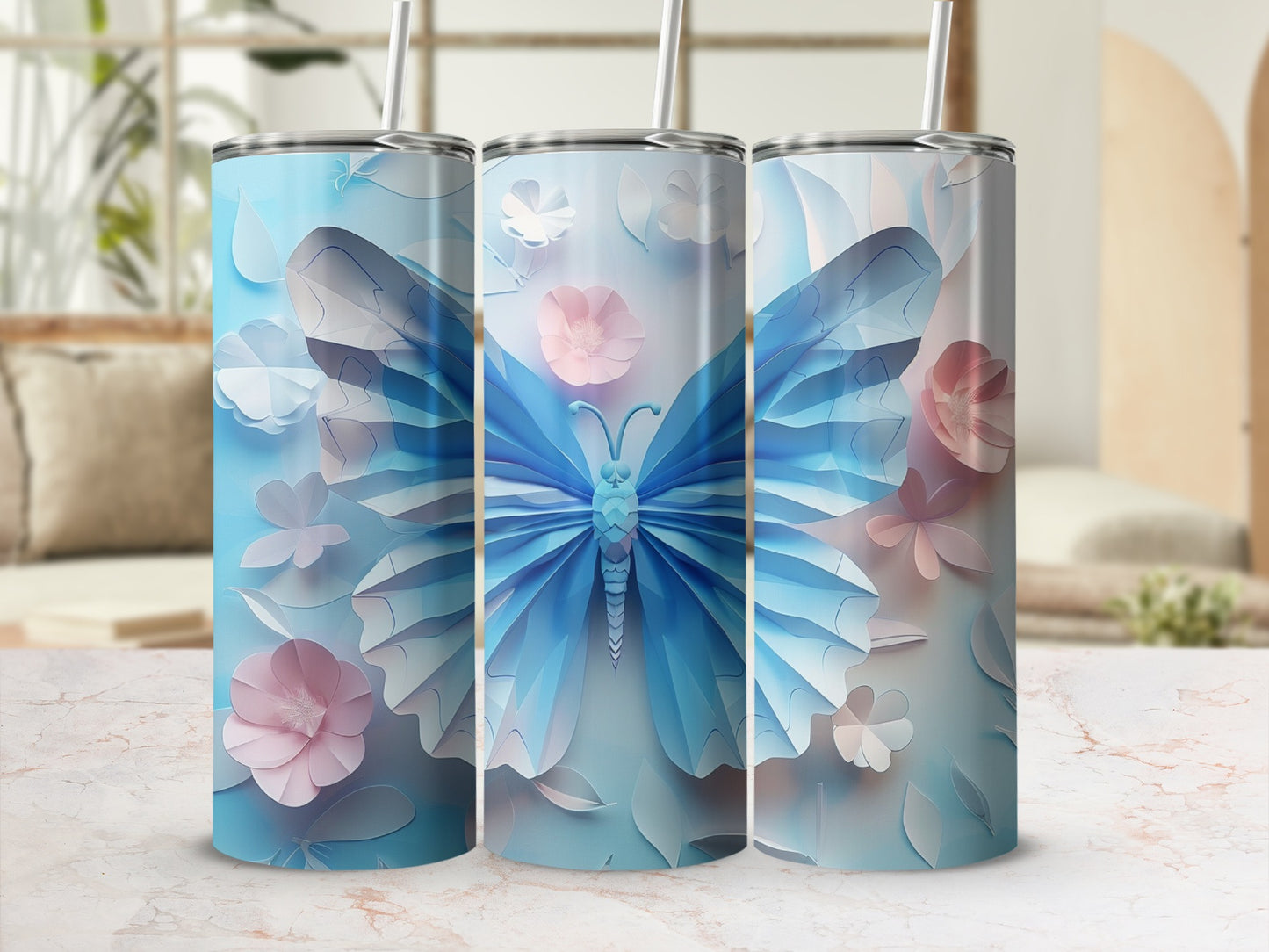 Three blue butterfly tumblers with pastel floral accents.