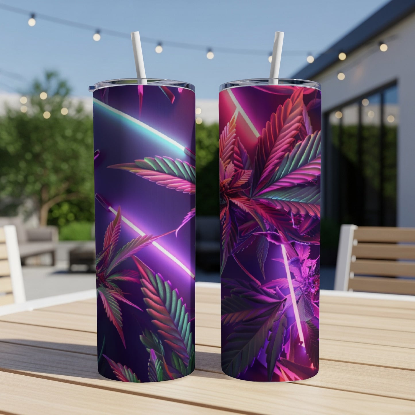 Two tall tumblers with cannabis leaf and neon light design on a table.