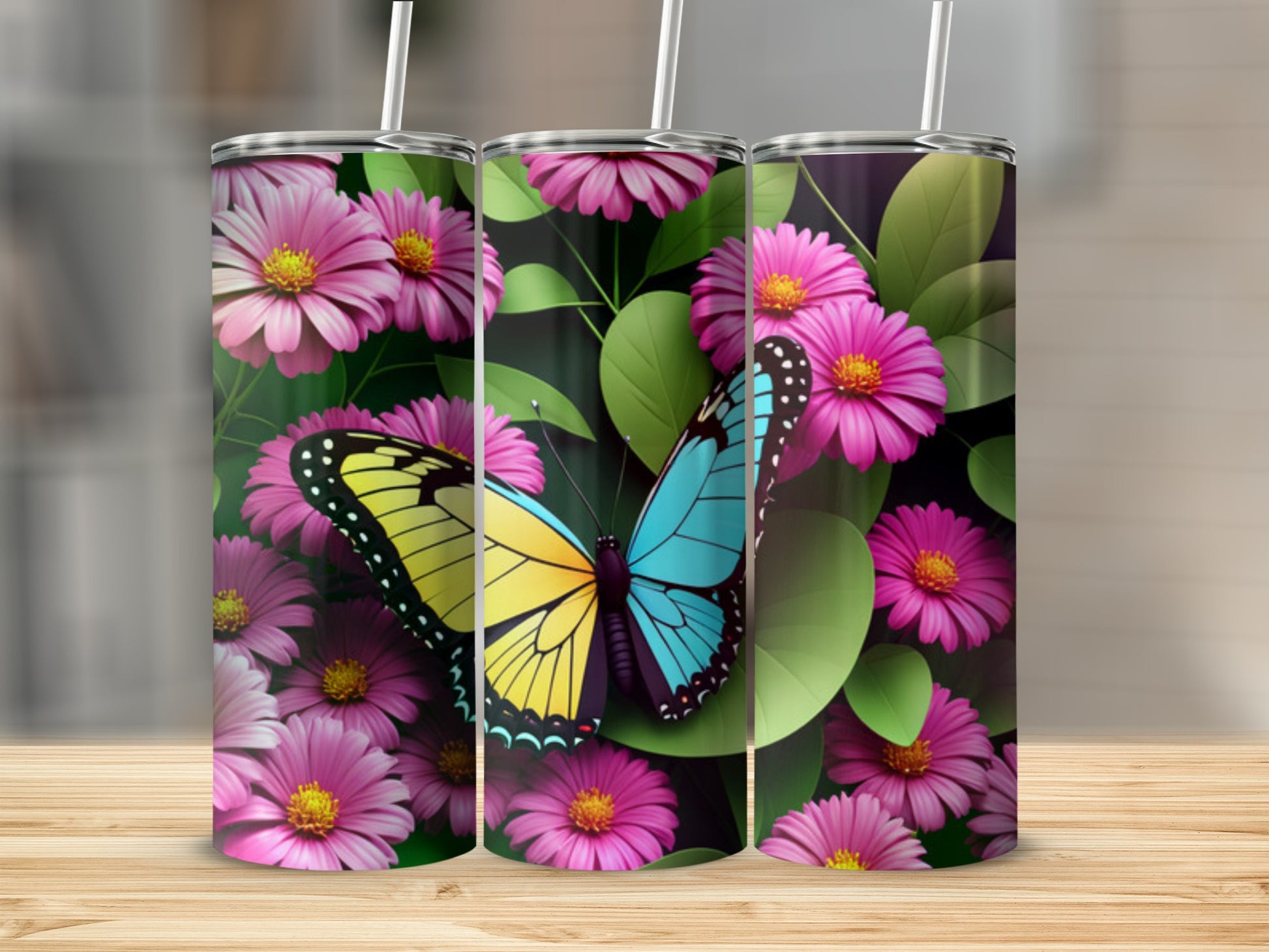 Triptych of tumblers featuring a blue and yellow butterfly among pink flowers.