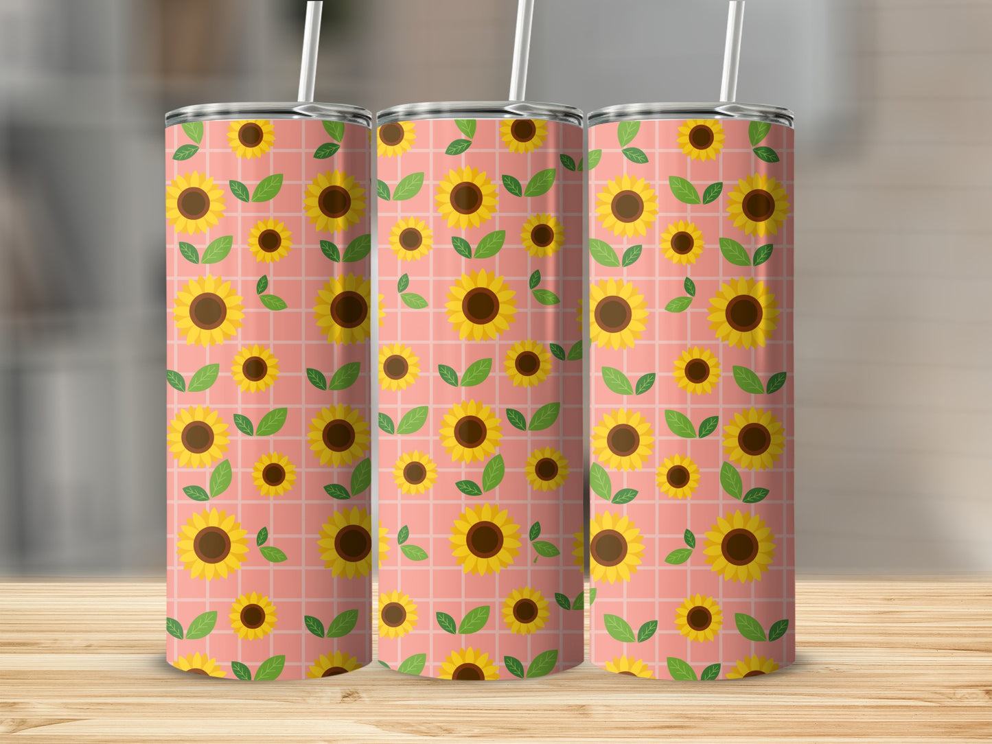 Three tumblers with a pink grid pattern and yellow sunflowers.