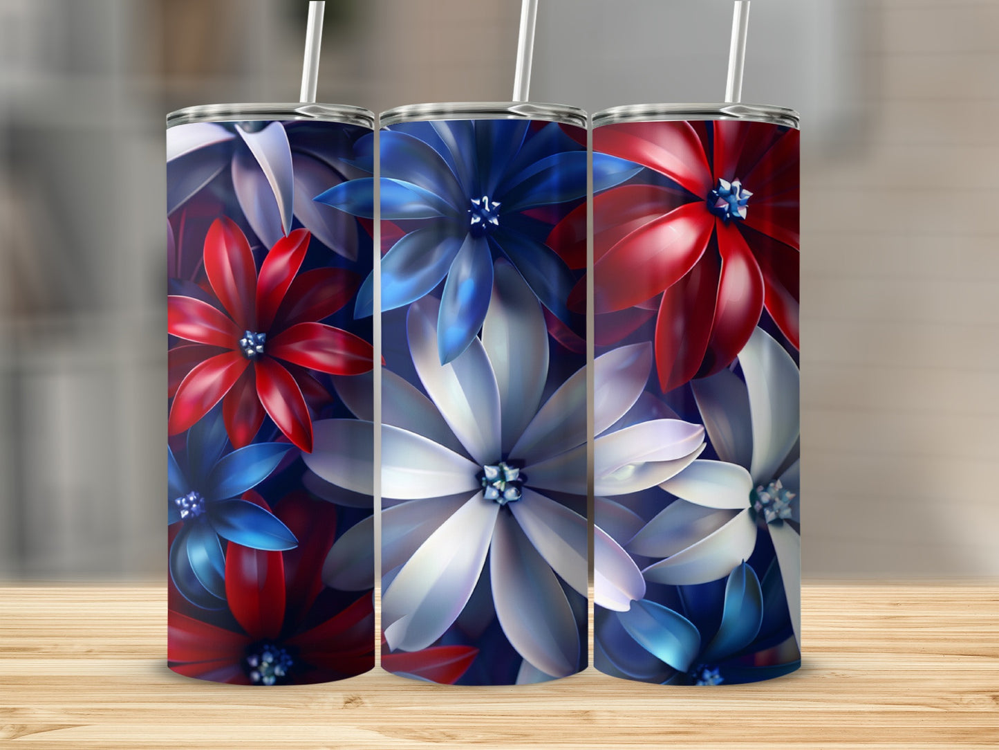 Three floral pattern tumblers with red, white, and blue flowers.