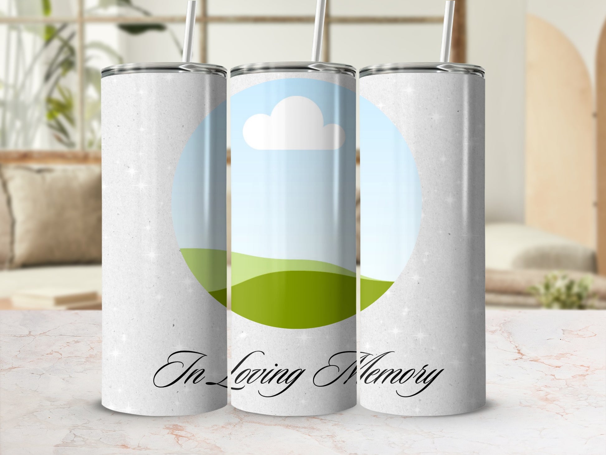 Three tumblers with a textured white background, one featuring a sky and green hills.