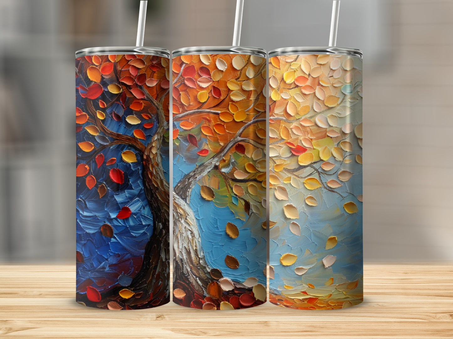 Three tumblers featuring a textured autumn tree with falling leaves.