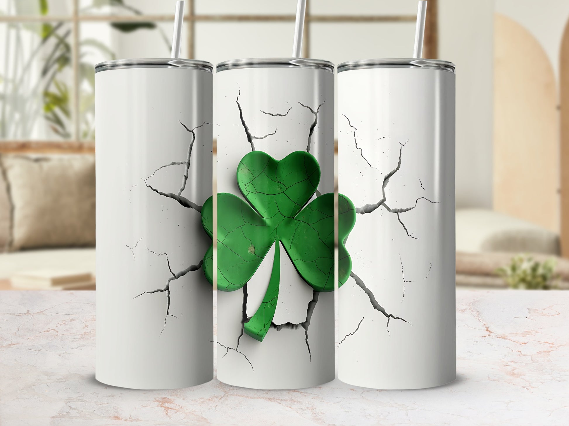 White tumbler with cracked design and a green shamrock.