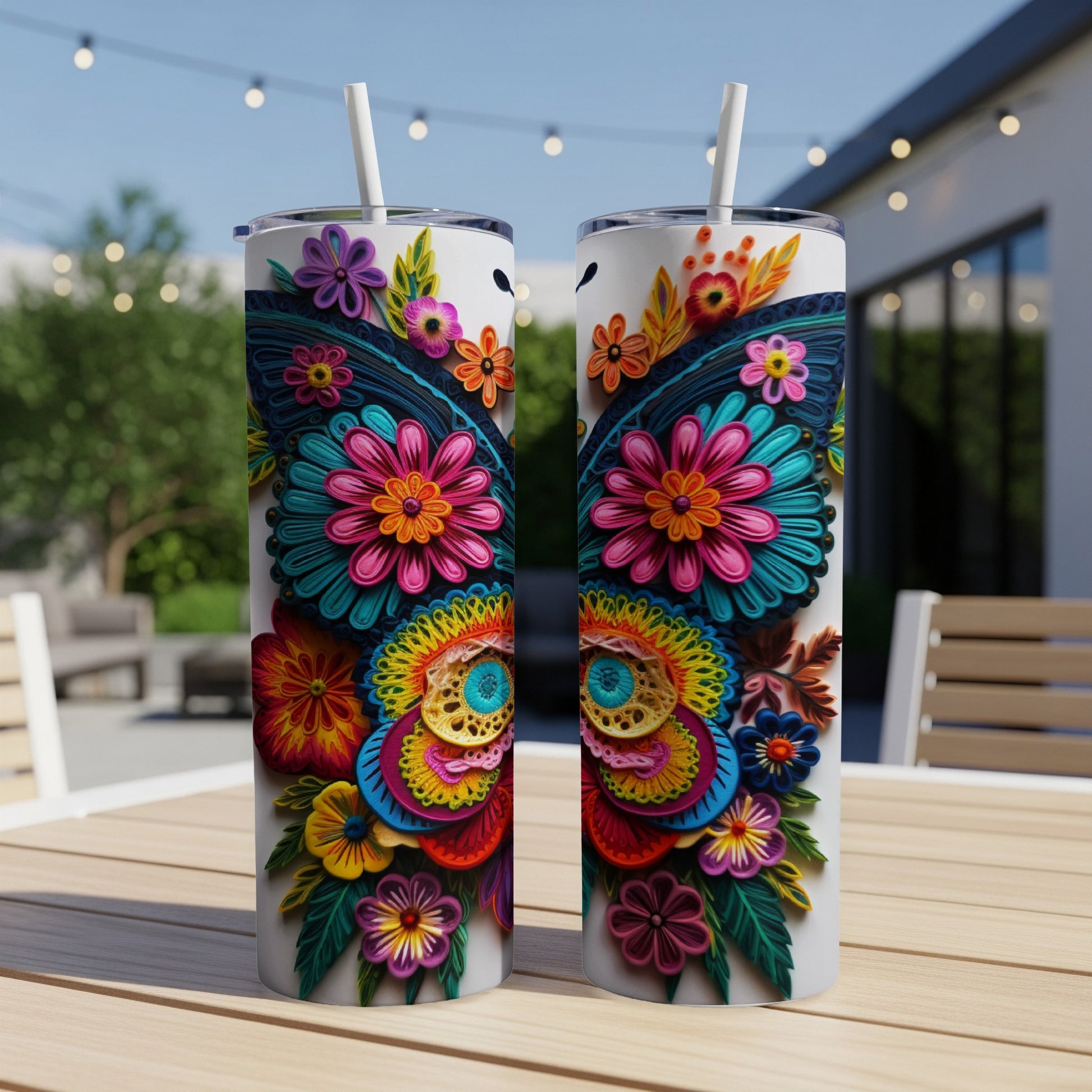 Two white tumblers with vibrant, colorful floral butterfly designs.