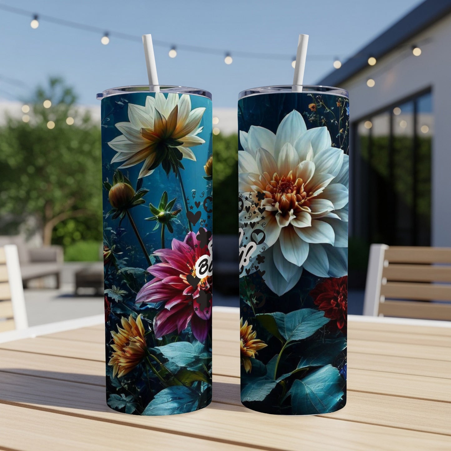 Two tall tumblers with a floral design featuring white and pink dahlias.