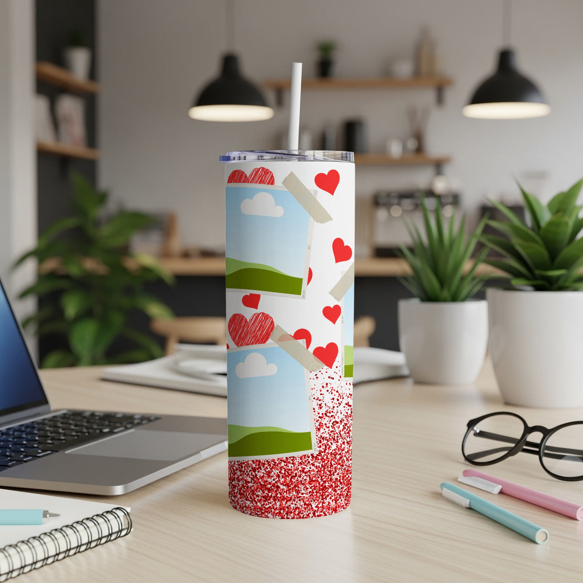 White tumbler with photo collage of clouds, hearts, and red glitter.