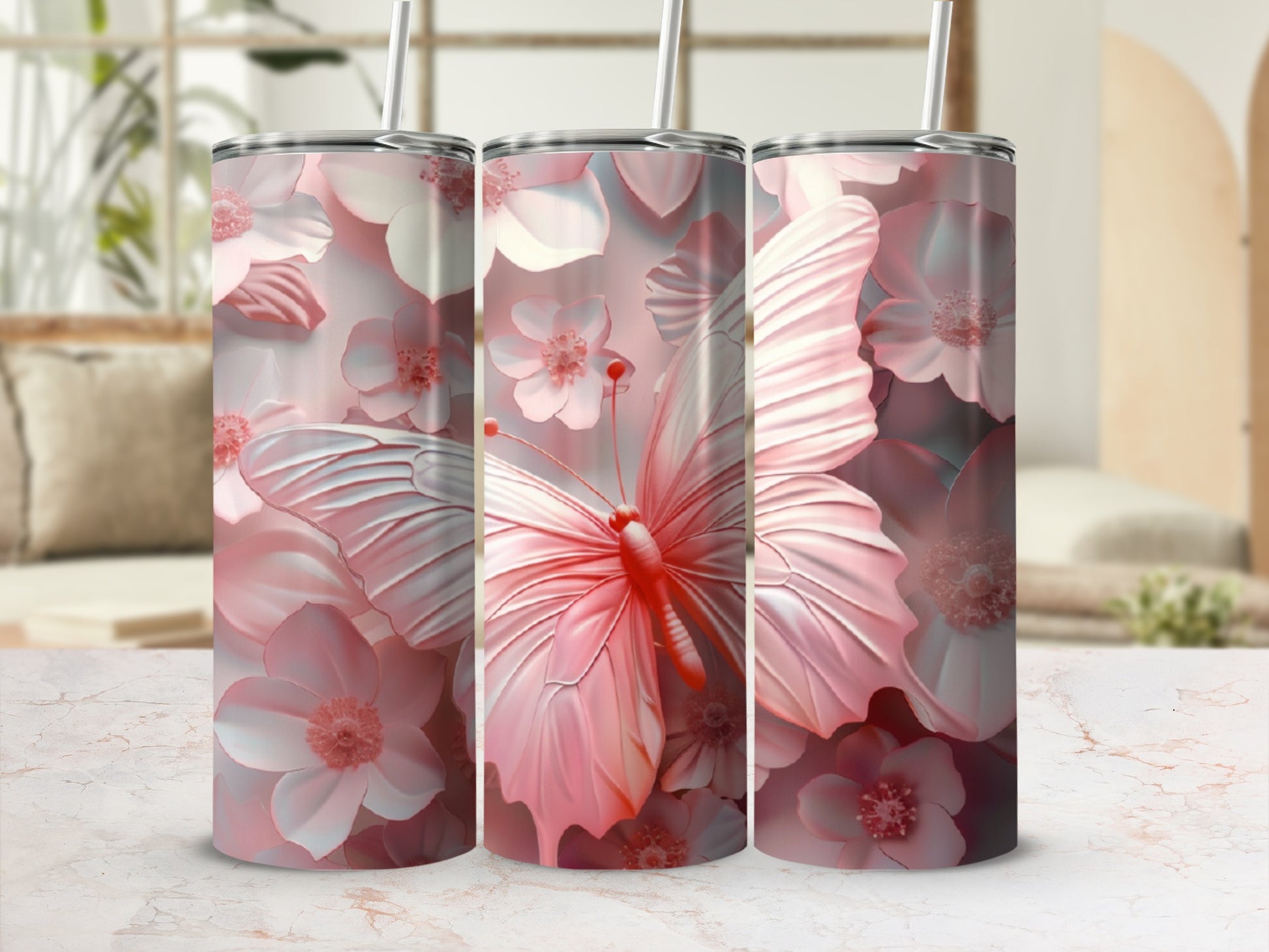 Pink butterfly and floral design on a tumbler.