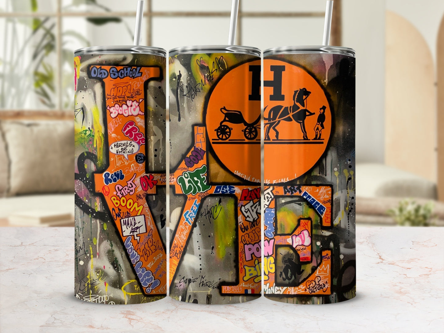 Three tumblers designed with graffiti art, text, and an orange circular logo with a horse and carriage.