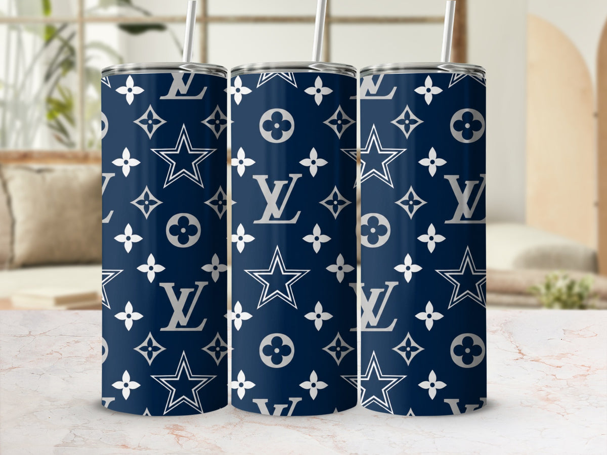 Three navy tumblers with repeating white star and clover patterns.