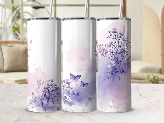 Three tumblers with watercolor floral and butterfly design in purple and pink.