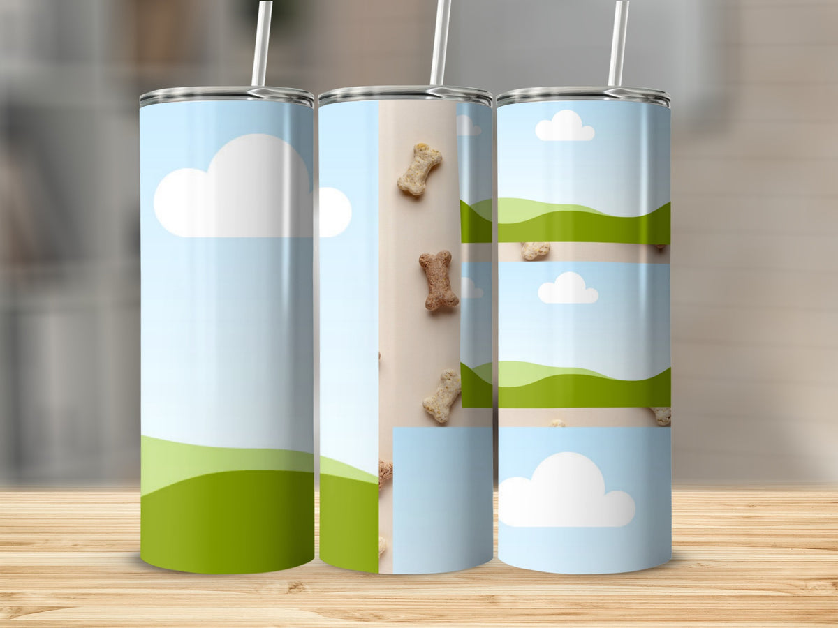 Three tumblers with a sky and green rolling hills design, some with dog biscuits.