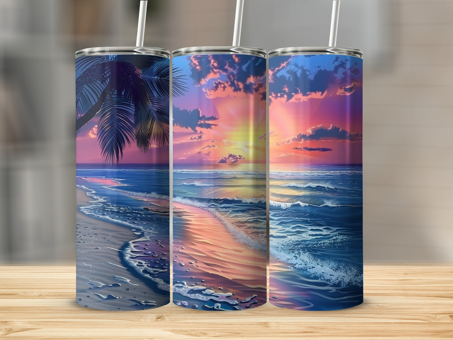 Beach sunset with palm tree silhouette on three tumblers.