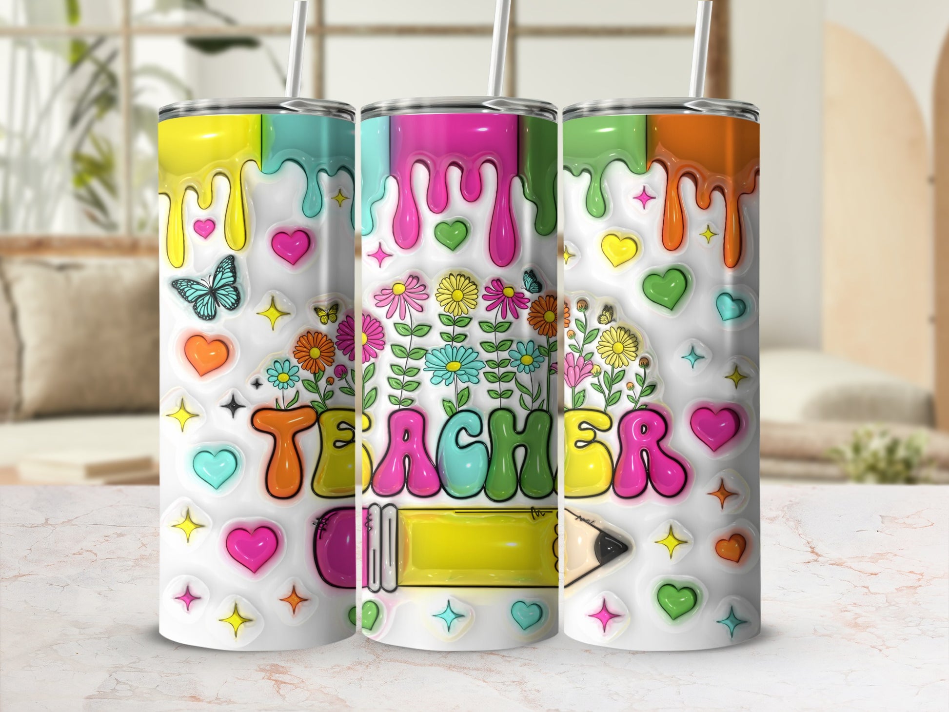 Teacher tumbler with colorful flowers, hearts, butterflies, and dripping paint design.
