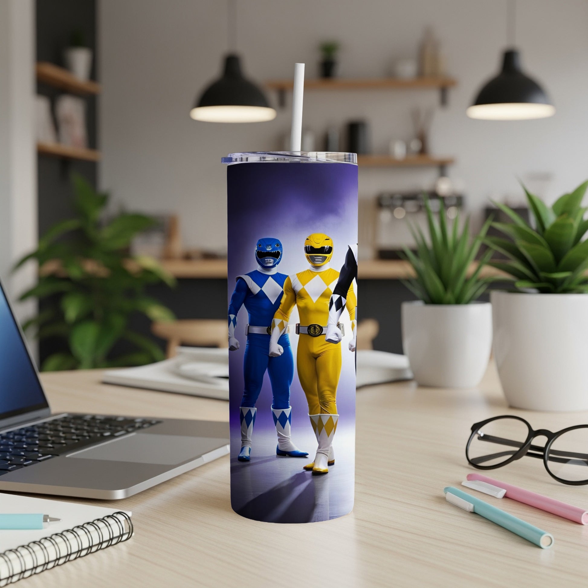 Blue and yellow Power Rangers standing side by side on a tumbler.