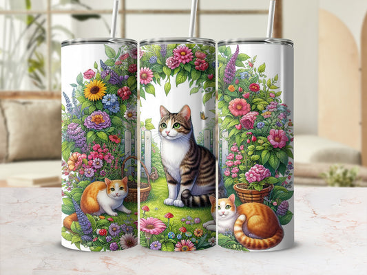 Two cats amidst colorful flowers and greenery on a white tumbler.