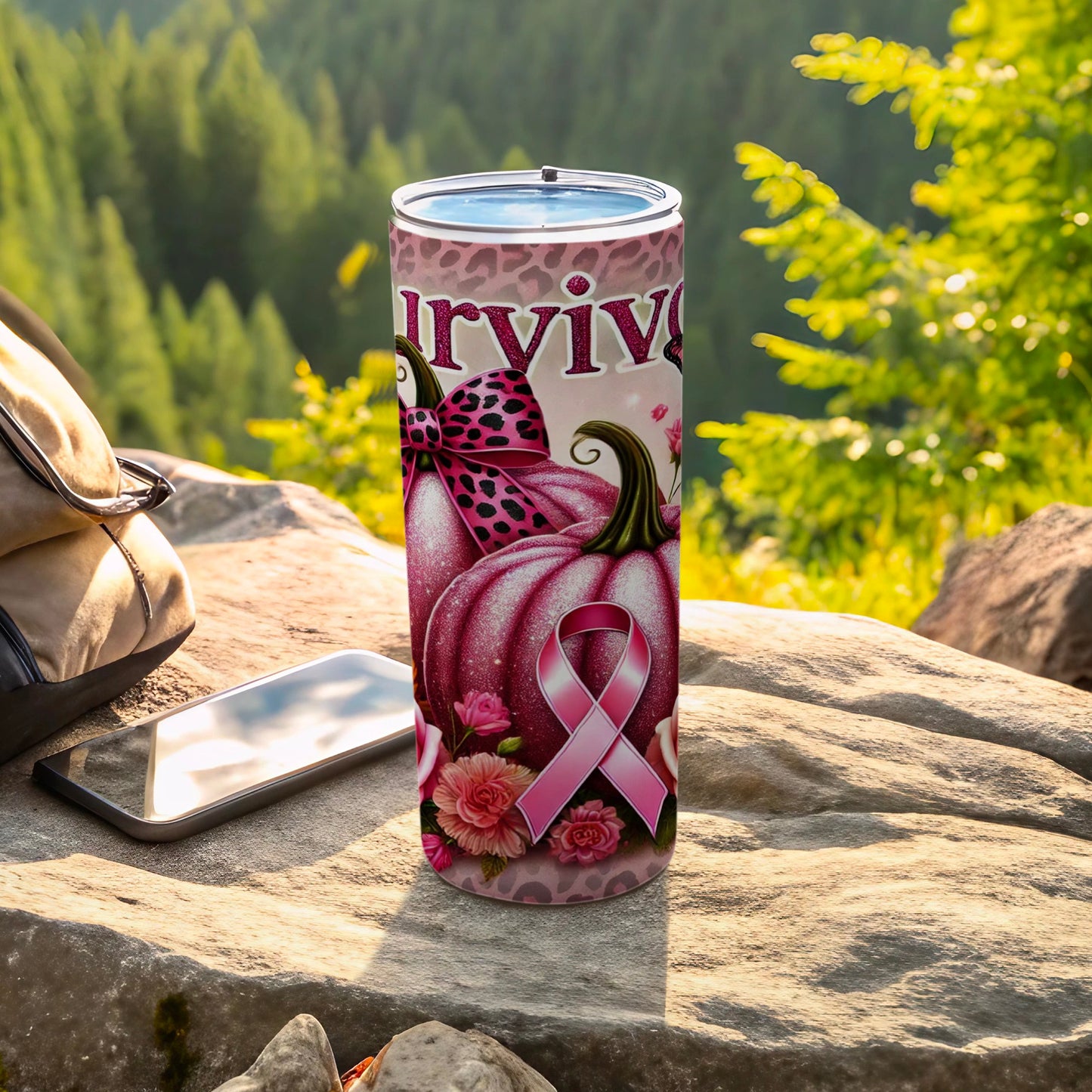 Tumbler with pink pumpkins, a ribbon, and flowers, reading "Survive".