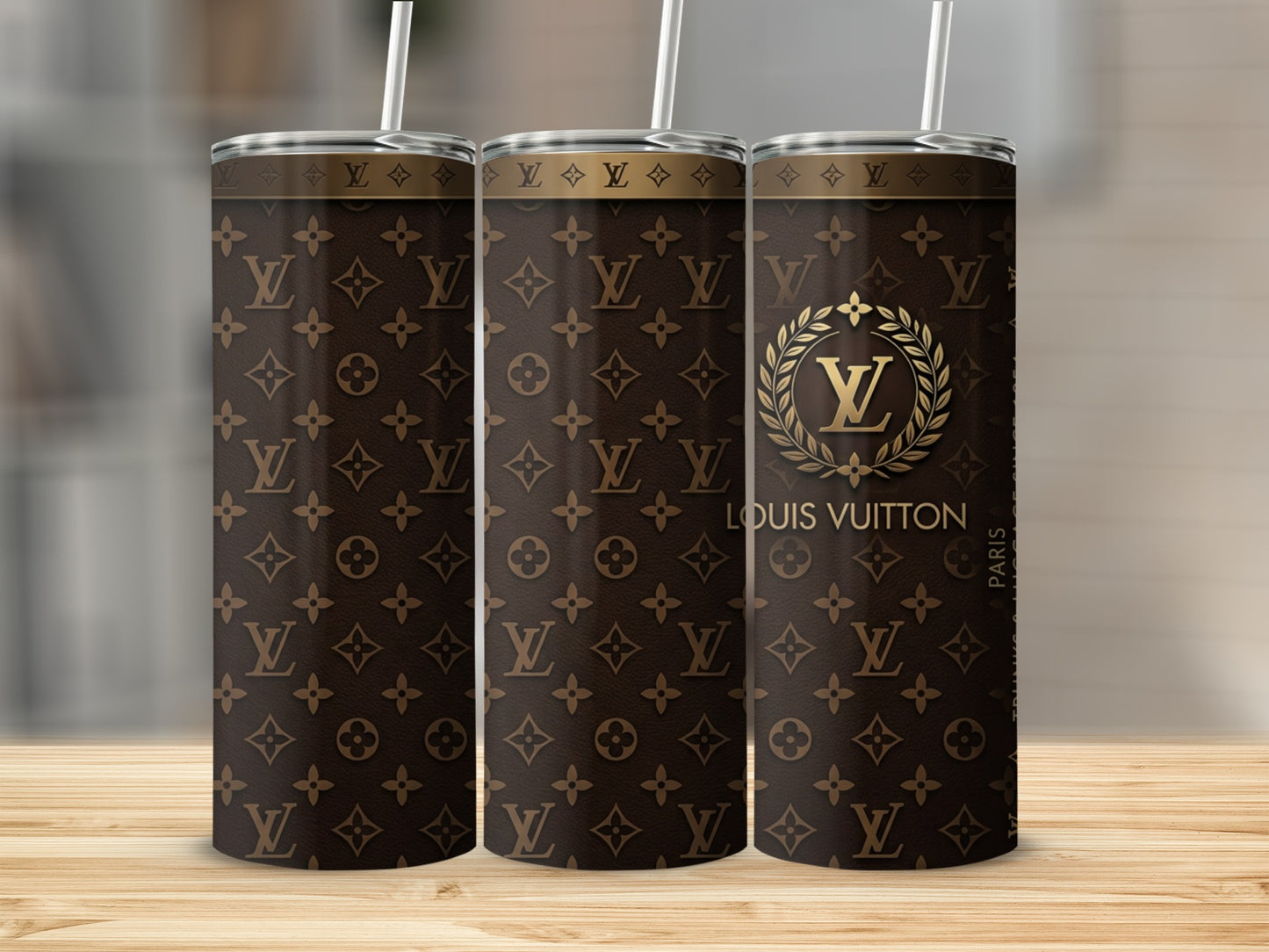 Tumbler with Louis Vuitton monogram pattern and gold laurel wreath.