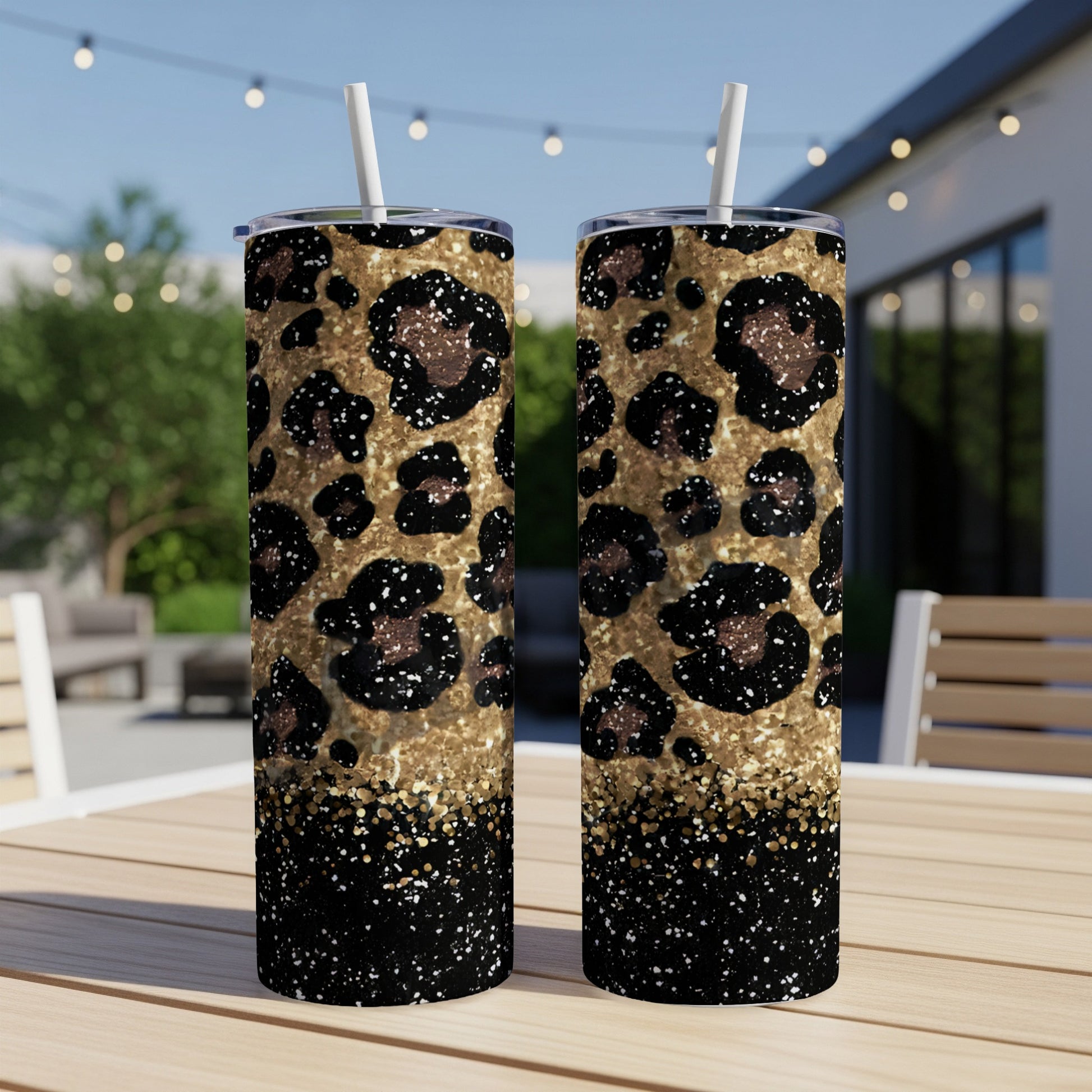 Two tumblers with gold glitter and leopard print design.