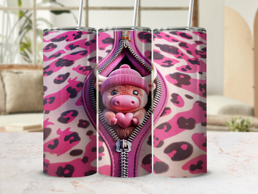 Pink leopard print tumbler with a cartoon cow peeking through a zipper.