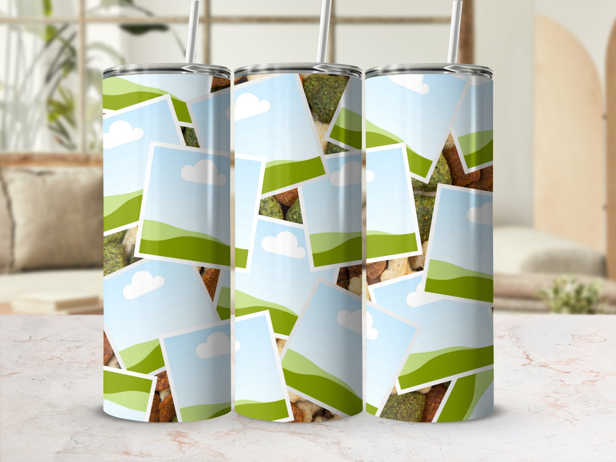 Three tumblers with a collage design of sky, clouds, green hills, and dog treats.