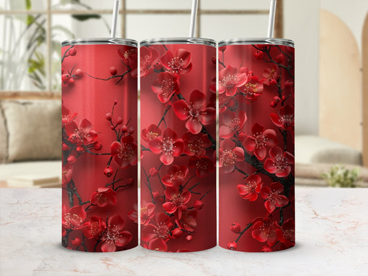 Three red tumblers with a dark red floral cherry blossom pattern.