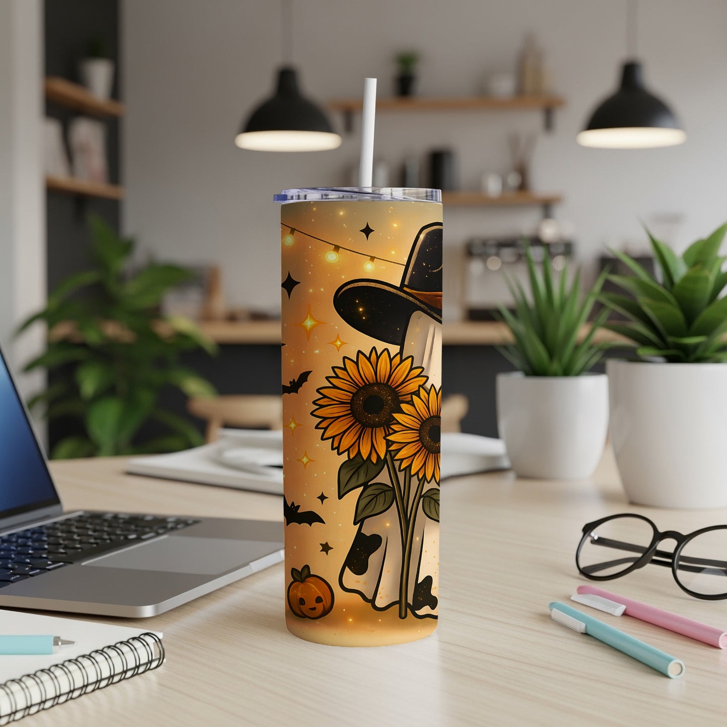 Tumbler with ghost, sunflowers, pumpkin, bats, and string lights design.