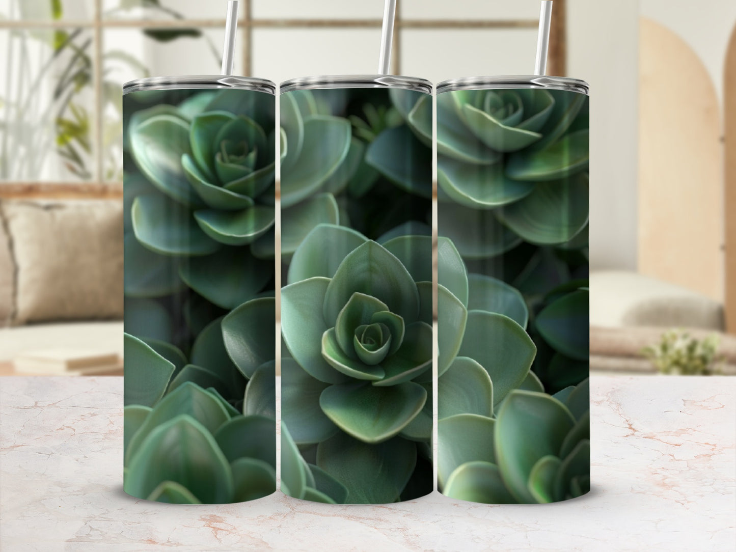 Three tumblers with a green succulent pattern, blurred background.