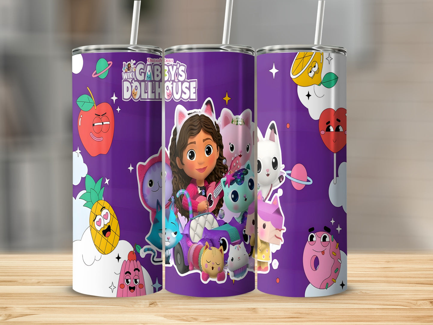 Gabby's Dollhouse tumbler with Gabby, Pandy Paws, and cartoon characters on a purple background.